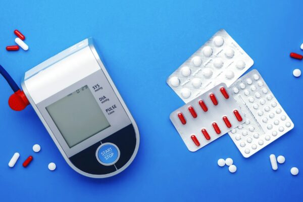 Automatic Tonometer, tablets, pills and red-white capsules for hypertension