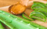 Close up of Aloe vera gel with aloe vera on wooden tray. Selective focus