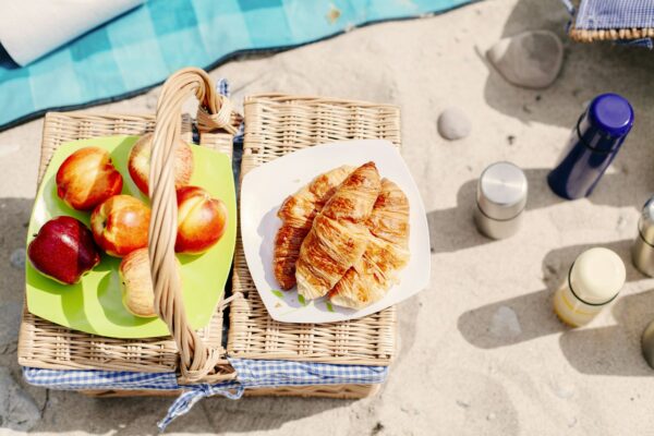 Food and drinks basket on beach