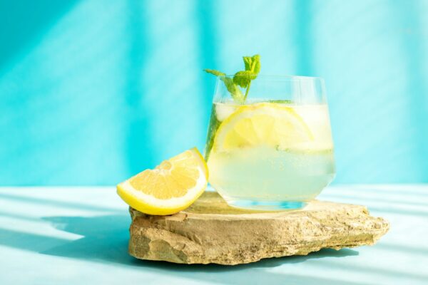 Fresh detox drink with cucumber and lemon slices
