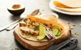 Making tacos with grilled chicken and avocado