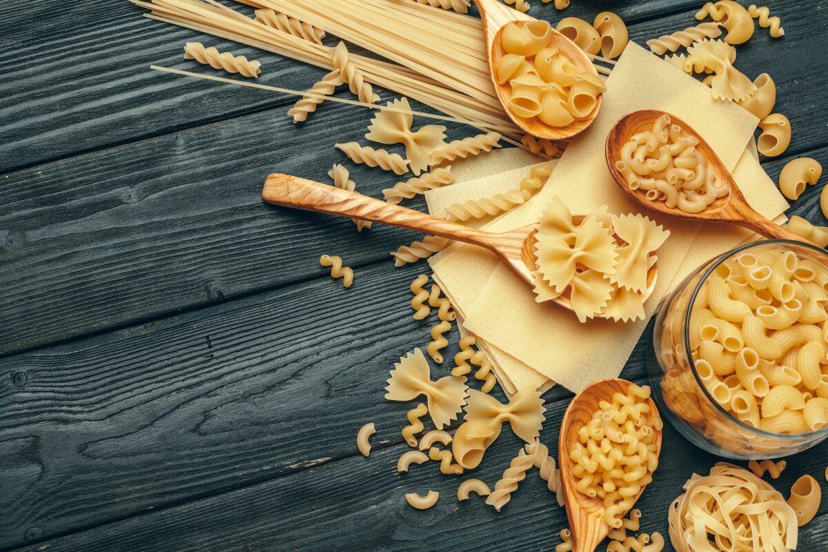 Various pasta on spoons