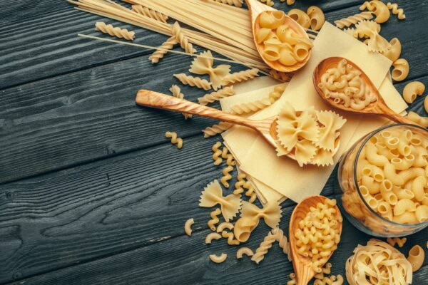 Various pasta on spoons