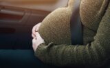 Pregnant woman with seat belt