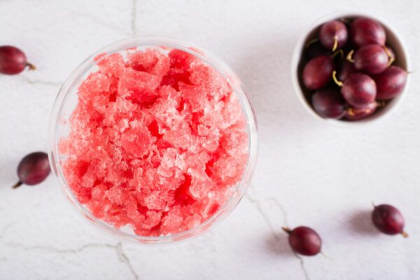 Summer drink frozen wine slushy in glasses. Refreshing alcoholic cocktail. Top view. Closeup
