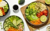 Bowls with tasty and nutritious food, top view