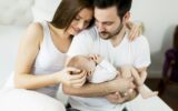 Happy family with newborn baby