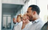 Tired, yawn and sleepless with a business man sitting in a meeting or presentation with his team fo