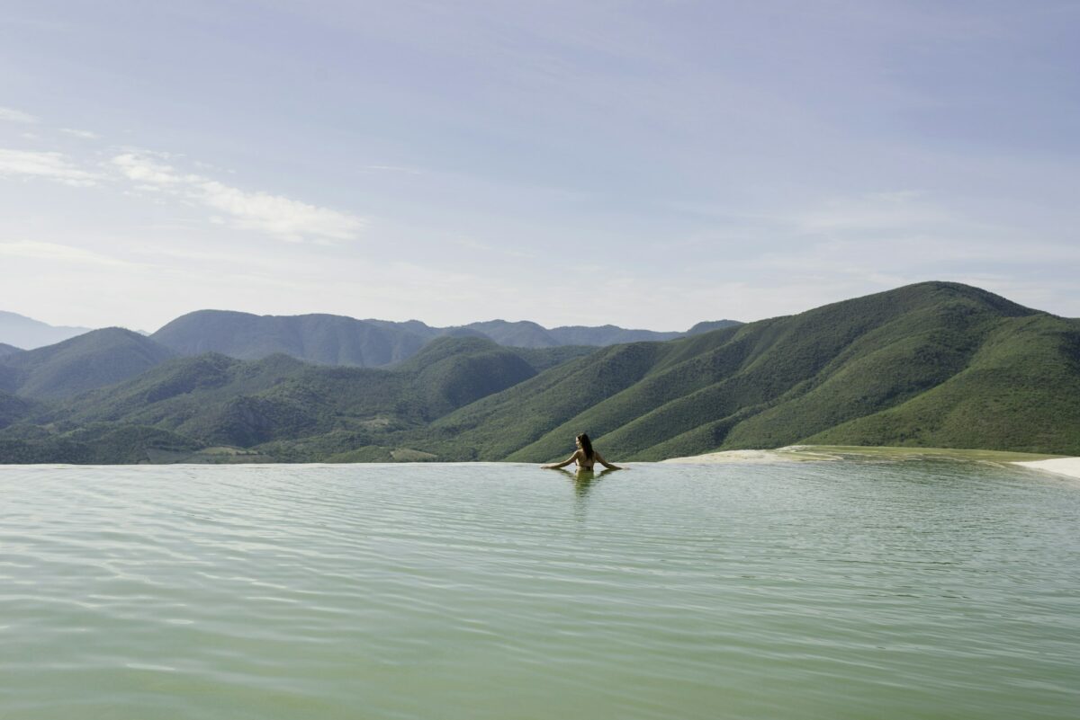 Woman relaxing in thermal spring, Hierve el Agua, Oaxaca, Mexico.
