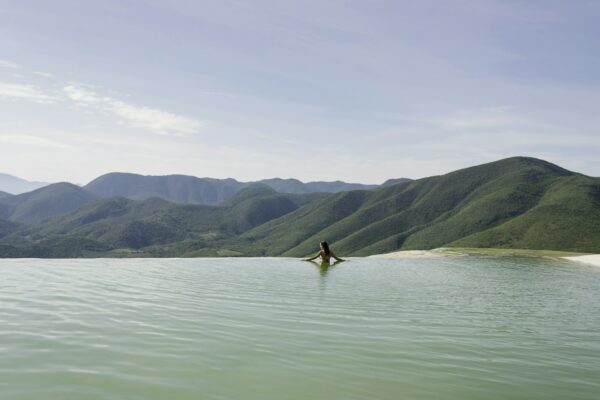 Woman relaxing in thermal spring, Hierve el Agua, Oaxaca, Mexico.