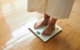 Checking body weight on digital scale
