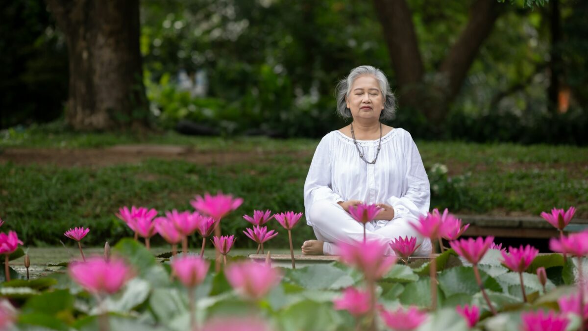Elderly Woman Practicing Yoga and Meditation