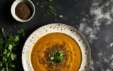 Lentils soup on a dark background