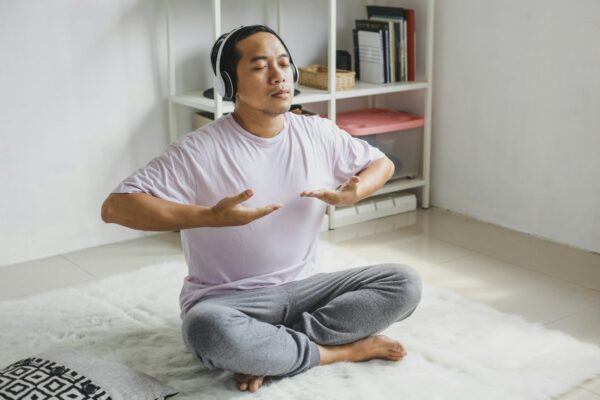 Man doing yoga breathing exercises