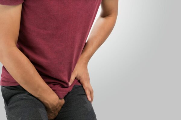 Man having groin pain.