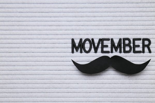 The inscription "Movember" in black letters on a light background