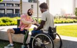 Friends with disabilities shaking hands