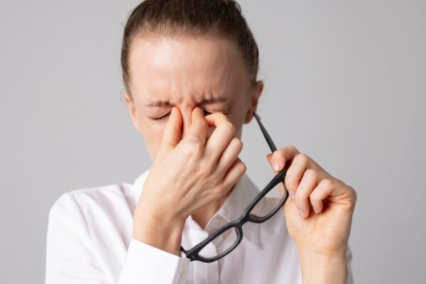Vision problem. adult woman massaging tired eyes, poor vision concept, ophthalmology